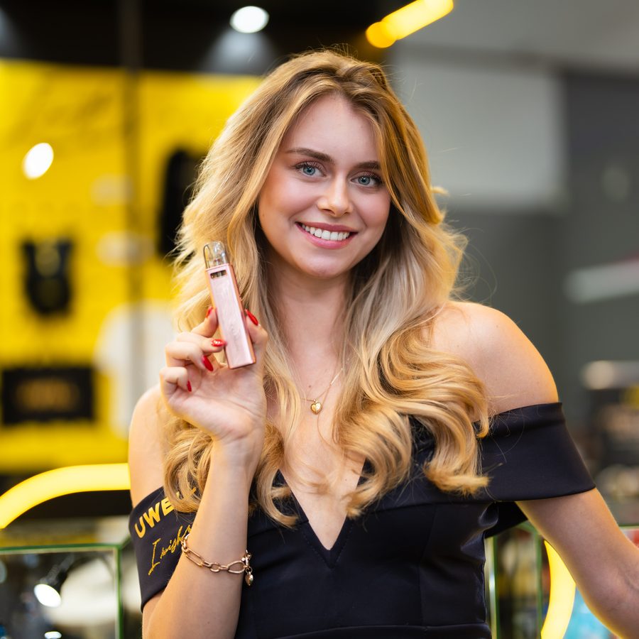 Brand ambassadors at a trade fair product showcase, photographed by Pixer