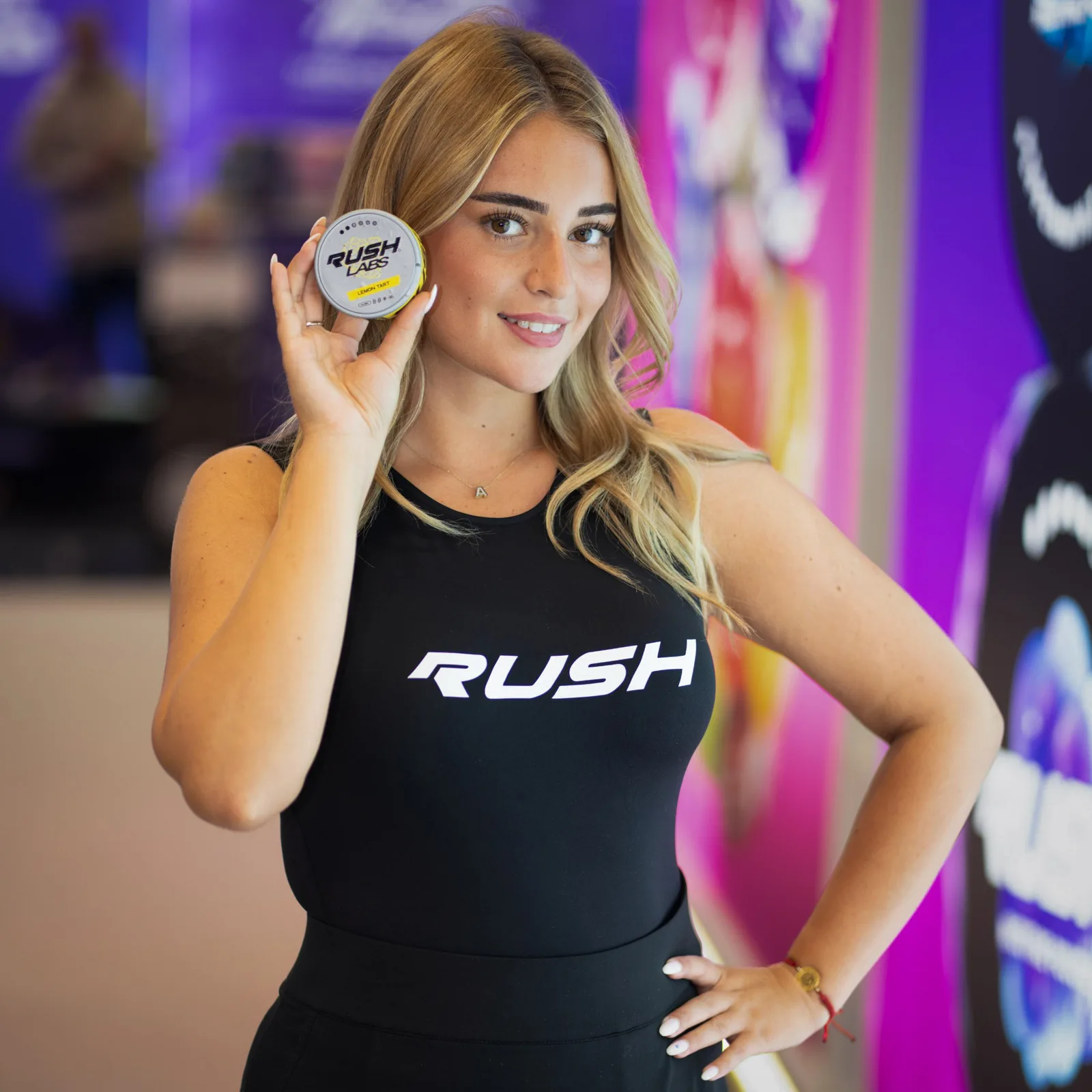 Hostess presenting a Rush Labs can, InterTabac 2026